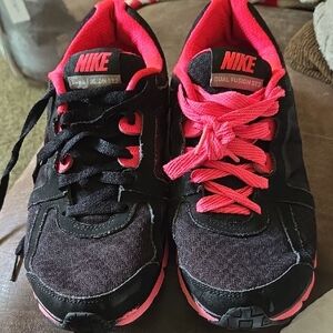 Nike Black and Pink Athletic Shoes with Vibrant Accents